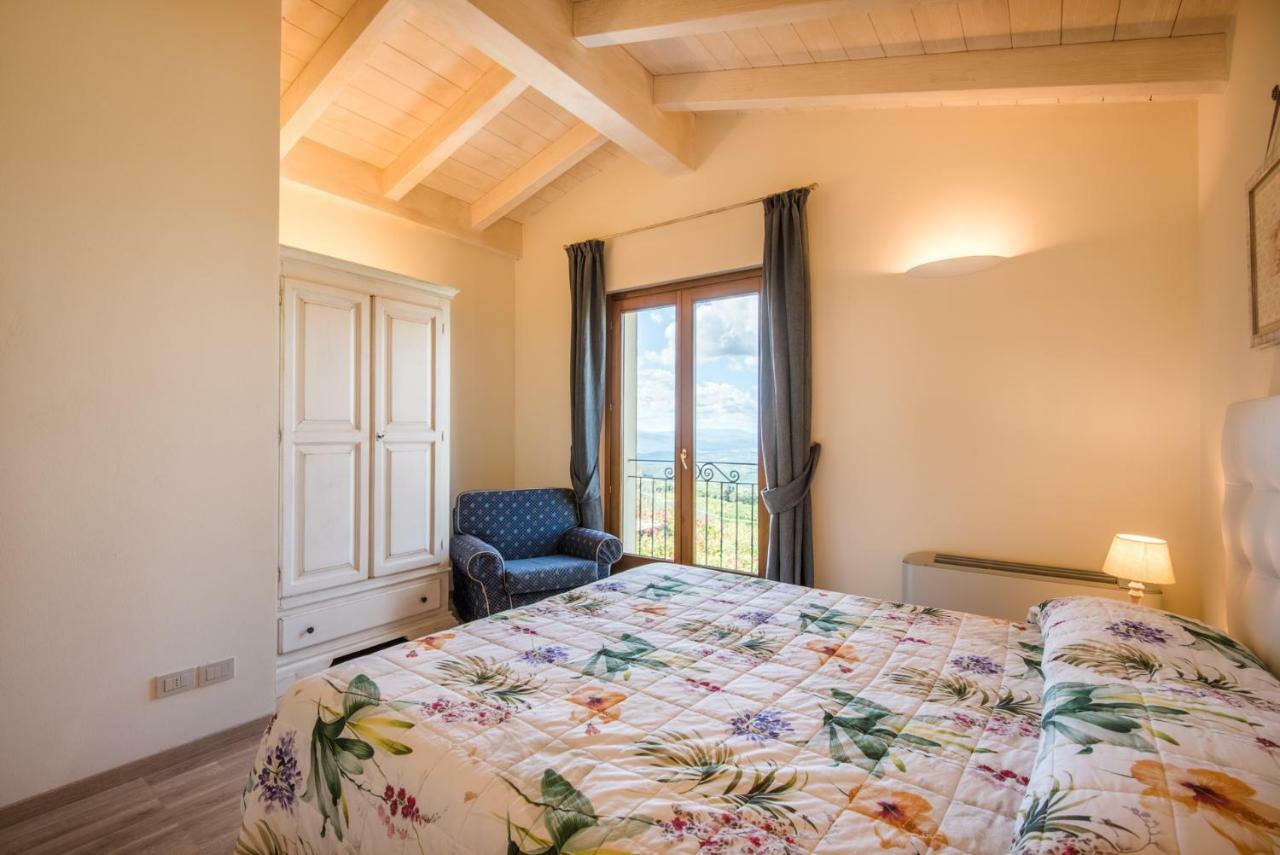 Casa Vacanze Squarcialupi カステッリーナ・イン・キアンティ シエナ エクステリア 写真